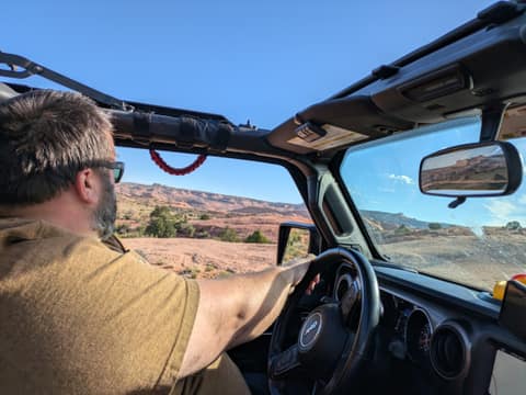 Dan driving doors-off on slickrock